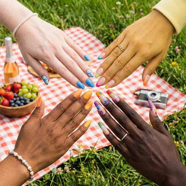 Joy nails in colorful shades like yellow, blue, orange, and neon.