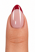 Pressing the Christmas press-on nail firmly from the center toward both sides