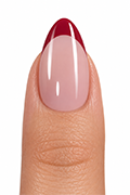 Finished red and white Christmas press-on manicure with natural-looking French tips